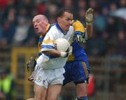 1 December 2002; Pascal Canavan, Errigal Ciaran, is tackled by Oliver O'Shea, Enniskillen. Errigal Ciaran v Enniskillen, Ulster Club Football Final, St. Tighearnachs Park, Clones, Co. Monaghan. Picture credit; Damien Eagers / SPORTSFILE *EDI*