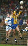 1 December 2002; Peter Loughran, (left), Errigal Ciaran, contests a high ball with Paul Brewster, Enniskillen. Errigal Ciaran v Enniskillen, Ulster Club Football Final, St. Tighearnachs Park, Clones, Co. Monaghan. Picture credit; Damien Eagers / SPORTSFILE *EDI*