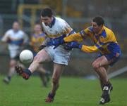 1 December 2002; Enda McGinley, Errigal Ciaran, is challenged by Neil Cox, Enniskillen. Errigal Ciaran v Enniskillen, Ulster Club Football Final, St. Tighearnachs Park, Clones, Co. Monaghan. Picture credit; Damien Eagers / SPORTSFILE *EDI*