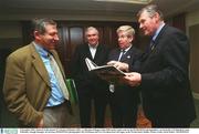 2 December 2002; Pictured at the launch of 'A Season of Sundays 2002', a collection of Images of the 2002 Gaelic Games year by the SPORTSFILE photographers, are from left, Ard Stiurthoir Liam Mulvihill, Armagh Manager Joe Kernan, SPORTSFILE photographer Ray McManus and GAA President Sean McCague, in the Westin Hotel, Dublin. Picture credit; David Maher / SPORTSFILE