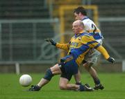 1 December 2002; Oliver McShea, Enniskillen, in action against Barry O'Donnell, Errigal Ciaran. Errigal Ciaran v Enniskillen, Ulster Club Football Final, St. Tighearnachs Park, Clones, Co. Monaghan. Picture credit; Damien Eagers / SPORTSFILE *EDI*