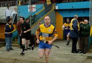 18 November 2002; The Sixmilebridge captain Christy Chaplin leads out his team with match referee Willie Barrett to his right. AIB Munster Club Hurling Semi-Final, Sixmilebridge (Clare) v Blackrock (Cork), Cusack Park, Ennis, Co. Clare. Picture credit; Ray McManus / SPORTSFILE *EDI*