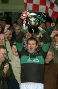 8 December 2002; Nemo Rangers captain Colin Corkery lifts the cup after victory in the Munster Club Football Championship final. Nemo Rangers v Monaleen, AIB Munster Club Football Championship, Killarney, Co. Kerry. Football. Picture credit; Matt Browne / SPORTSFILE *EDI*
