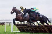 14 December 2002; Rosaker with Paul Carberry up , right, clears the last ahead of Running On, Adrian Lane up, to win the Curragha Maiden Hurdle, Fairyhouse, Co. Meath. Horse Racing. Picture credit; David Maher / SPORTSFILE *EDI*