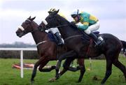 14 December 2002; Rosaker with Paul Carberry up , right,  ahead of Running On, Adrian Lane up, on his way to winning the Curragha Maiden Hurdle, Fairyhouse, Co. Meath. Horse Racing. Picture credit; David Maher / SPORTSFILE *EDI*