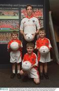 16 December 2002; Kieran McGeeney, All Star Armagh captain and player of the year pictured with Donnacha Tynan, (5), Aaron Tynan, (7), and Killiian Fox, (5), Gaelic Gear in association with Kieran McGeeney launches their juvenile Gaelic collection for the young stars of the future, GAA Museum, Croke Park. Picture credit; Damien Eagers / SPORTSFILE