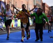 29 October 2017; Ernest Asensio from Trim, Co Meath, crosses the finish line during the SSE Airtricity Dublin Marathon 2017 at Merrion Square in Dublin City. 20,000 runners took to the Fitzwilliam Square start line to participate in the 38th running of the SSE Airtricity Dublin Marathon, making it the fifth largest marathon in Europe. Photo by Sam Barnes/Sportsfile