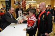 13 September 2012; Former Liverpool FC manager Rafa Benitez with Alan Browne and his son Josh, age 11, from Ballymun, Dublin, during a signing session for his new book, Champions League Dreams, which is available from Eason stores nationwide and from easons.com. Rafa Benitez Book Signing, Easons, O'Connell Street, Dublin. Picture credit: Brian Lawless / SPORTSFILE