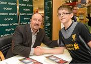 13 September 2012; Former Liverpool FC manager Rafa Benitez with Mark Carroll, age 12, from Ardee, Co. Louth, during a signing session for his new book, Champions League Dreams, which is available from Eason stores nationwide and from easons.com. Rafa Benitez Book Signing, Easons, O'Connell Street, Dublin. Picture credit: Brian Lawless / SPORTSFILE