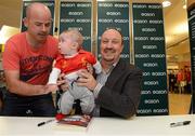 13 September 2012; Former Liverpool FC manager Rafa Benitez with Paul Moore and his son Emlyn, age 4 months, from Finglas, Dublin, during a signing session for his new book, Champions League Dreams, which is available from Eason stores nationwide and from easons.com. Rafa Benitez Book Signing, Easons, O'Connell Street, Dublin. Picture credit: Brian Lawless / SPORTSFILE