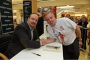 13 September 2012; Former Liverpool FC manager Rafa Benitez had a signing session for his book, Champions League Dreams, which is available from Eason stores nationwide and from easons.com. Benitez is pictured with Martin Kelly, from Donnycarney, Dublin. Rafa Benitez Book Signing, Easons, O'Connell Street, Dublin. Picture credit: Brian Lawless / SPORTSFILE
