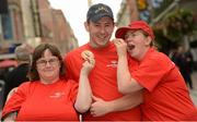 15 September 2012; Linda Clowry, left, Glasnevin, Dublin, Garda Aidan Fitzpatrick, Kilkenny Garda Station, and Fiona Byrne, Navan Road, Dublin, who were on hand to sell donuts from Dolly’s Donut Shop on Dublin’s Henry Street today. The Cops on Donut shops event was organised to raise funds for Special Olympics Ireland. Henry Street, Dublin. Photo by Sportsfile