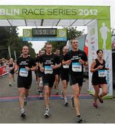 15 September 2012; Stuart King, Paul McDermott, and Michael Barcoe, lead home their team from the Irish Air Corps, Dublin. Entrants ran, walked and jogged the 13 mile course in what was the fourth and final race in the four part Dublin Race series. The Half Marathon represents the last major hurdle for Marathon hopefuls ahead of the Dublin Marathon on October 29th. Entry remains open for the Dublin Marathon until Monday 1st October see www.dublinmarathon.ie for more details. Dublin Race Series Half Marathon 2012, Phoenix Park, Dublin. Picture credit: Tomas Greally / SPORTSFILE