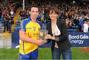 15 September 2012; Niall Kilroy, Roscommon, is presented with the Bord Gáis Energy Man of the Match award by Irene Gowing, Sponsorship Manager at Bord Gáis Energy. Bord Gáis Energy GAA Hurling Under 21 All-Ireland 'B' Championship Final, Kildare v Roscommon, Semple Stadium, Thurles, Co. Tipperary. Picture credit: Diarmuid Greene / SPORTSFILE