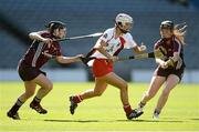 16 September 2012; Teresa McElroy, Derry, in action against Sinead Keane, left, and Clodagh McGrath, Galway. All-Ireland Intermediate Camogie Championship Final, Derry v Galway, Croke Park, Dublin. Picture credit: David Maher / SPORTSFILE