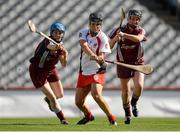 16 September 2012; Katie McAnenly, Derry, shoots to score her side's second goal, despite the efforts of Galway defenders Paula Kenny, left, and Sarah Noone. All-Ireland Intermediate Camogie Championship Final, Derry v Galway, Croke Park, Dublin. Picture credit: Matt Browne / SPORTSFILE