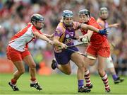 16 September 2012; Katrina Parrock, Wexford, in action against Joanne O'Callaghan, left, and Gemma O'Connor, Cork. All-Ireland Senior Camogie Championship Final, Cork v Wexford, Croke Park, Dublin. Picture credit: David Maher / SPORTSFILE