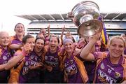 16 September 2012; Wexford players, from left to right, Kate Kelly, Ursula Jacob, Deirdre Codd, Karen Atkinson and Katrina Parrock celebrate with the O'Duffy Cup after the game. All-Ireland Senior Camogie Championship Final, Cork v Wexford, Croke Park, Dublin. Picture credit: David Maher / SPORTSFILE