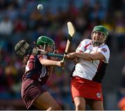 16 September 2012; Claire O'Kane, Derry, in action against Aoibhinn Kenny, Galway. All-Ireland Intermediate Camogie Championship Final, Derry v Galway, Croke Park, Dublin. Picture credit: David Maher / SPORTSFILE