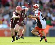 16 September 2012; Catriona Cormican, Galway, in action against Sinead Cassidy, Derry. All-Ireland Intermediate Camogie Championship Final, Derry v Galway, Croke Park, Dublin. Picture credit: David Maher / SPORTSFILE
