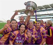 16 September 2012; Wexford players, from left to right, Mary Leacy, Ursula Jacob, Una Leacy, Karen Atkinson and Colleen Atkinson celebrate with the O'Duffy Cup. All-Ireland Senior Camogie Championship Final, Cork v Wexford, Croke Park, Dublin. Picture credit: Matt Browne / SPORTSFILE