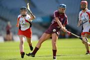 16 September 2012; Orla Curtin, Galway, in action against Maria Mooney, Derry. All-Ireland Intermediate Camogie Championship Final, Derry v Galway, Croke Park, Dublin. Picture credit: Matt Browne / SPORTSFILE