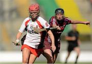 16 September 2012; Grainne McGoldrick, Derry, in action against Sarah Noone, Galway. All-Ireland Intermediate Camogie Championship Final, Derry v Galway, Croke Park, Dublin. Photo by Sportsfile