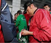 14 September 2012; Mayo manager James Horan signs autographs during an open supporters night ahead of their side's GAA Football All-Ireland Senior Championship Final game against Donegal on Sunday 23rd September. Mayo Open Training Night, Elverys MacHale Park, Castlebar, Co. Mayo. Picture credit: Pat Murphy / SPORTSFILE