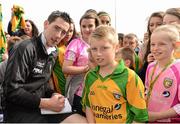 8 September 2012; Donegal's Mark McHugh signing autographs for fans after an open training session ahead of their side's GAA Football All-Ireland Senior Championship Final game against Mayo on Sunday 23rd September. Donegal Open Training, MacCumhaill Park, Ballybofey, Co. Donegal. Picture credit: Oliver McVeigh / SPORTSFILE