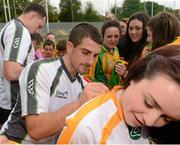 8 September 2012; Donegal's Paddy McGrath signing autographs for fans after an open training session ahead of their side's GAA Football All-Ireland Senior Championship Final game against Mayo on Sunday 23rd September. Donegal Open Training, MacCumhaill Park, Ballybofey, Co. Donegal. Picture credit: Oliver McVeigh / SPORTSFILE