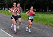 15 September 2012; Patricia Wlodarczyk, left, Raheny Shamrock A.C., Dublin, Brian Long and Anglea Mc Cann, right, both from Clonmel, A.C., Co. Tipperary, in action during the Dublin Half Marathon. Entrants ran, walked and jogged the 13 mile course in what was the fourth and final race in the four part Dublin Race series. The Half Marathon represents the last major hurdle for Marathon hopefuls ahead of the Dublin Marathon on October 29th. Entry remains open for the Dublin Marathon until Monday 1st October see www.dublinmarathon.ie for more details. Dublin Race Series Half Marathon 2012, Phoenix Park, Dublin. Picture credit: Tomas Greally / SPORTSFILE