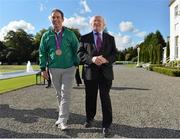21 September 2012; President of Ireland Michael D. Higgins with Team Ireland's Cian O'Connor at a reception for the London 2012 Irish Olympic team at Aras an Uachtarain, Phoenix Park, Dublin. Picture credit: Brian Lawless / SPORTSFILE