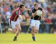22 September 2012; Kieran McGourty, Naomh Gall, Co. Antrim, in action against Barry McGoldrick, Eoghan Rua, Co. Derry, in the semi-final of the FBD All-Ireland Football 7s Competition. The competition, now in its 40th year, attracted top club teams from all over Ireland and provided a day of fantastic football for GAA fans. FBD All-Ireland Football 7s Competition, Kilmacud Crokes GAA Club, Stillorgan, Co. Dublin. Photo by Sportsfile