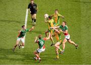 23 September 2012; Rory Kavanagh gets to the ball ahead of team-mates, Neil Gallagher, and Frank Gallager, Donegal, and Mayo players, left to right, Jason Doherty, Aidan O'Shea, and Barry Moran. GAA Football All-Ireland Senior Championship Final, Donegal v Mayo, Croke Park, Dublin. Picture credit: Daire Brennan / SPORTSFILE