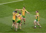 23 September 2012; Donegal players, left to right, Neil McGee, Neil Gallagher, Michael Murphy, and Dermot Molloy, celebrate after the game. GAA Football All-Ireland Senior Championship Final, Donegal v Mayo, Croke Park, Dublin. Picture credit: Daire Brennan / SPORTSFILE