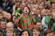 23 September 2012; A Mayo supporter tries to encourage her side during the game. Supporters at GAA Football All-Ireland Championship Finals, Croke Park, Dublin. Picture credit: Pat Murphy / SPORTSFILE