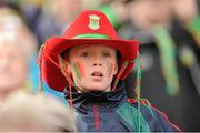 23 September 2012; A Mayo supporter watches the game. Supporters at GAA Football All-Ireland Championship Finals, Croke Park, Dublin. Picture credit: Pat Murphy / SPORTSFILE