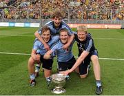 23 September 2012; Dublin players from the Kilmacud Crokes GAA Club, left to right, Shane Cunningham, Ross McGowan, David Campbell, and Conor Ferris, celebrate with the Tom Markham cup after the game. Electric Ireland GAA Football All-Ireland Minor Championship Final, Dublin v Meath, Croke Park, Dublin. Picture credit: Daire Brennan / SPORTSFILE