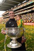 23 September 2012; Donegal manager Jim McGunninness, with his 18 month old son Jimmy, and the Sam Maguire Cup after the game. GAA Football All-Ireland Senior Championship Final, Donegal v Mayo, Croke Park, Dublin. Picture credit: Ray McManus / SPORTSFILE