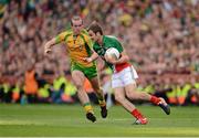 23 September 2012; Jason Gibbons, Mayo, in action against Neil Gallagher, Donegal. GAA Football All-Ireland Senior Championship Final, Donegal v Mayo, Croke Park, Dublin. Picture credit: Stephen McCarthy / SPORTSFILE