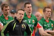 23 September 2012; Mayo capyain Andy Moran, 2nd from left, who did not play through injury, watches the presentation of the cup with team-mates Jason Gibbons, Barry Moran, 8 and Donal Vaughan. GAA Football All-Ireland Senior Championship Final, Donegal v Mayo, Croke Park, Dublin. Picture credit: Brendan Moran / SPORTSFILE