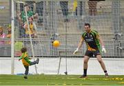 23 September 2012; Mark Anthony McGuinness, son of Donegal manager Jim McGuinness, takes a shot on Donegal goalkeeper Paul Durcan after the game. GAA Football All-Ireland Senior Championship Final, Donegal v Mayo, Croke Park, Dublin. Picture credit: Brendan Moran / SPORTSFILE