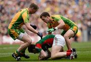 23 September 2012; Cillian O'Connor, Mayo, in action against Anthony Thompson, left, and Eamon McGee, Donegal. GAA Football All-Ireland Senior Championship Final, Donegal v Mayo, Croke Park, Dublin. Picture credit: David Maher / SPORTSFILE