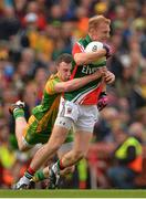 23 September 2012; Richie Feeney, Mayo, is tackled by Martin McElhinney, Donegal. GAA Football All-Ireland Senior Championship Final, Donegal v Mayo, Croke Park, Dublin. Picture credit: Brendan Moran / SPORTSFILE