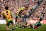 23 September 2012; Cillian O'Connor, Mayo, clashes with Anthony Thompson, centre, and Eamon McGee, Donegal. GAA Football All-Ireland Senior Championship Final, Donegal v Mayo, Croke Park, Dublin. Picture credit: David Maher / SPORTSFILE