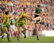 23 September 2012; Barry Moran, Mayo, in action against Mark McHugh and Leo McLoone, Donegal. GAA Football All-Ireland Senior Championship Final, Donegal v Mayo, Croke Park, Dublin. Picture credit: Oliver McVeigh / SPORTSFILE