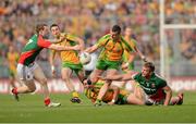 23 September 2012; Leo McLoone, Donegal, in action against Colm Boyle, left, and Aidan O'Shea, Mayo. GAA Football All-Ireland Senior Championship Final, Donegal v Mayo, Croke Park, Dublin. Photo by Sportsfile