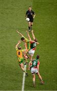 23 September 2012; Referee Maurice Deegan throws in the ball for the start of the second half and it is contested by Donegal midfielders Neil Gallagher, left, and Rory Kavanagh, and Mayo midfielders, Aidan O'Shea, left, and Barry Moran. GAA Football All-Ireland Senior Championship Final, Donegal v Mayo, Croke Park, Dublin. Picture credit: Daire Brennan / SPORTSFILE