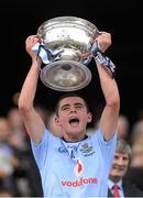 23 September 2012; Niall Scully, Dublin, lifts the Tom Markam Cup. Electric Ireland GAA Football All-Ireland Minor Championship Final, Dublin v Meath, Croke Park, Dublin. Picture credit: Stephen McCarthy / SPORTSFILE