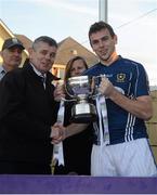 22 September 2012; Martin Skelly, Chairman of the Leinster Council, presenting the cup to Sean Burke, captain of Naomh Gall, Co. Antrim, at the FBD All-Ireland Football 7s Competition. The competition, now in its 40th year, attracted top club teams from all over Ireland and provided a day of fantastic football for GAA fans. FBD All-Ireland Football 7s Competition, Kilmacud Crokes GAA Club, Stillorgan, Co. Dublin. Photo by Sportsfile